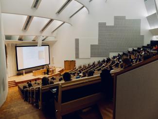 students sitting in a college lecture hall