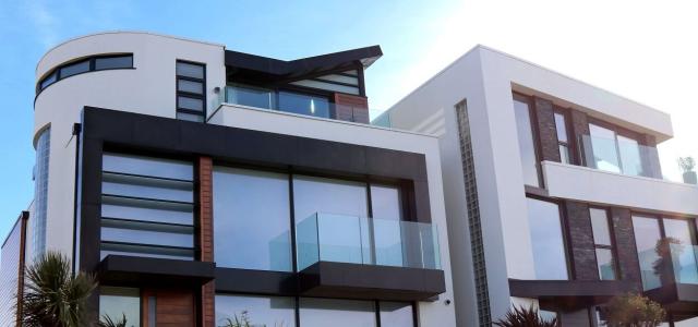 2 large houses next to each other